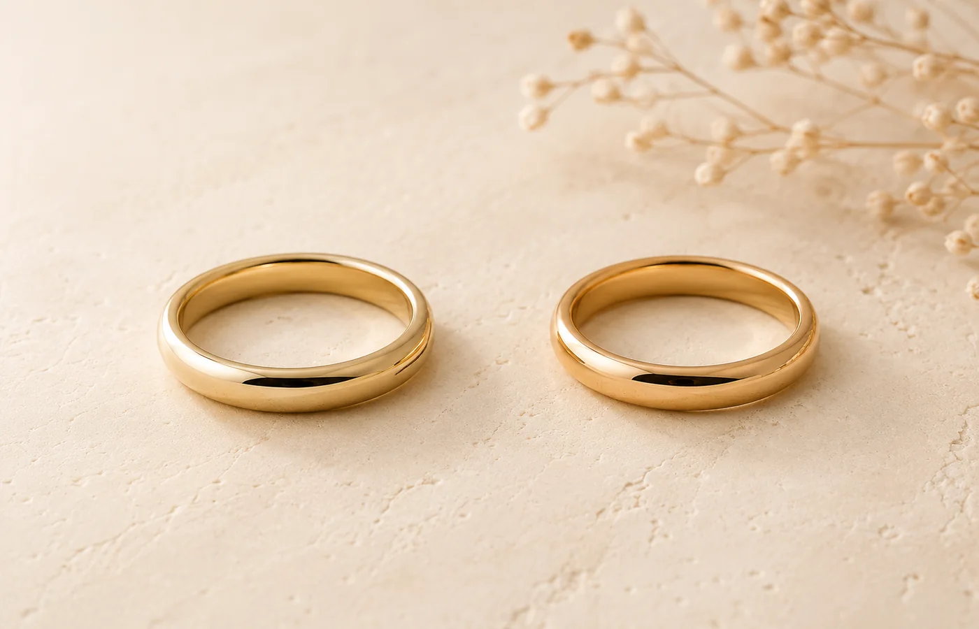 Two polished gold bands shown side by side for a neutral 14k and 18k comparison.